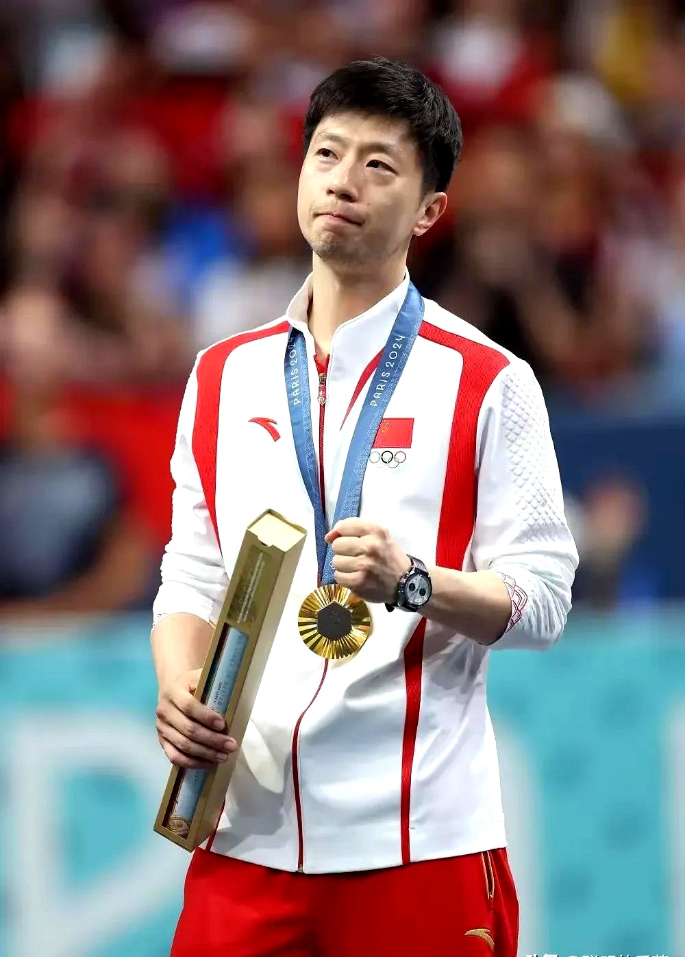 中国选手刘国梁在亚运会射箭项目中夺金 中国选手刘国梁在亚运会射箭项目中夺金